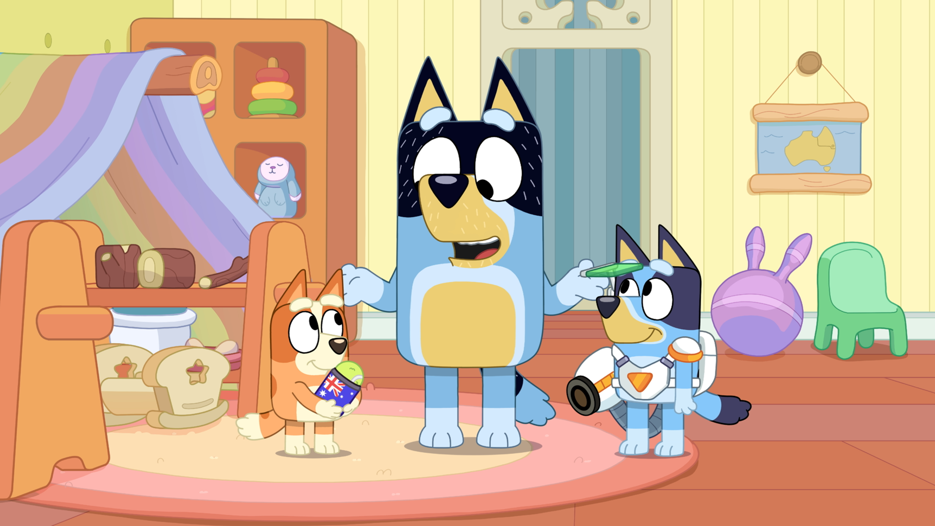 Bandit, Bingo and Bluey standing in playroom